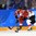 GANGNEUNG, SOUTH KOREA - FEBRUARY 12: Switzerland's Livia Altmann #22 and Japan's Ami Nakamura #23 chase down a loose puck during preliminary round action at the PyeongChang 2018 Olympic Winter Games. (Photo by Matt Zambonin/HHOF-IIHF Images)

